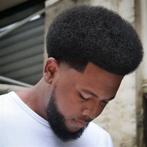 Afro taper fade - RELATED: 24 Stylish Taper Fade Haircuts for Men RELATED: 18 Best Fade Haircuts & Hairstyles for Men 1. Temp Fade Afro. Give your natural afro a polished twist with a temple fade. Together, the combination will showcase your hair’s fantastic texture and volume while creating a sleek and modern appearance.